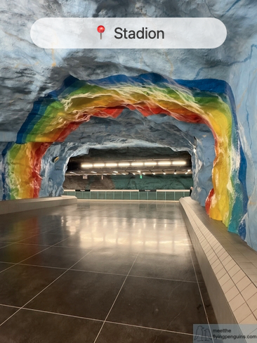 Stadion metro station with rainbow across the cave ceiling