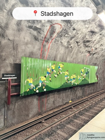 Stadshagen metro station with colorful sports illustrations
